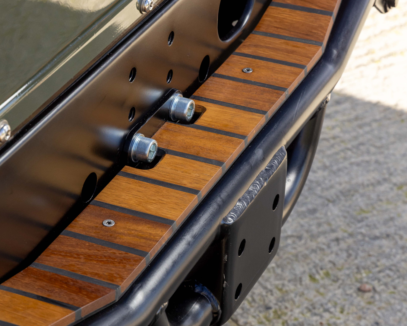 Iroko wood NAS-Style rear step on a Land Rover Defender 110